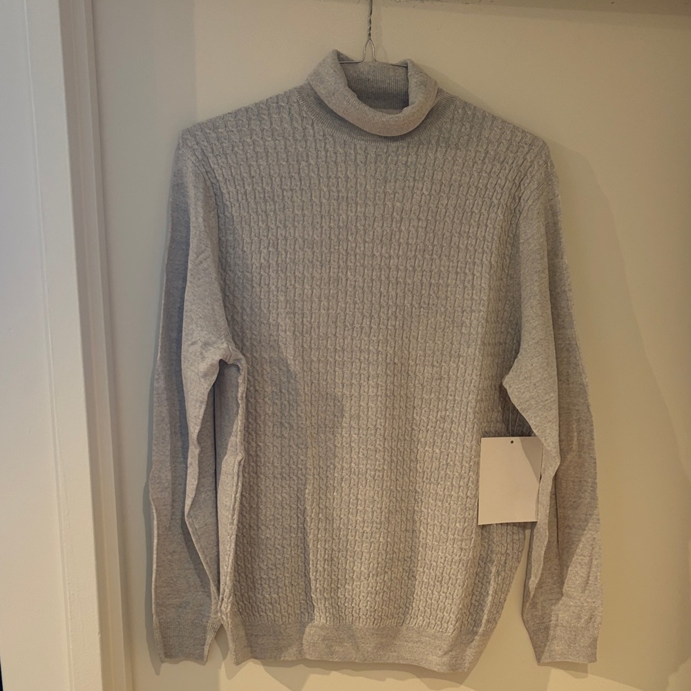 Elegant Turtleneck Sweater for Men Made by Tagio in China 
Size large.